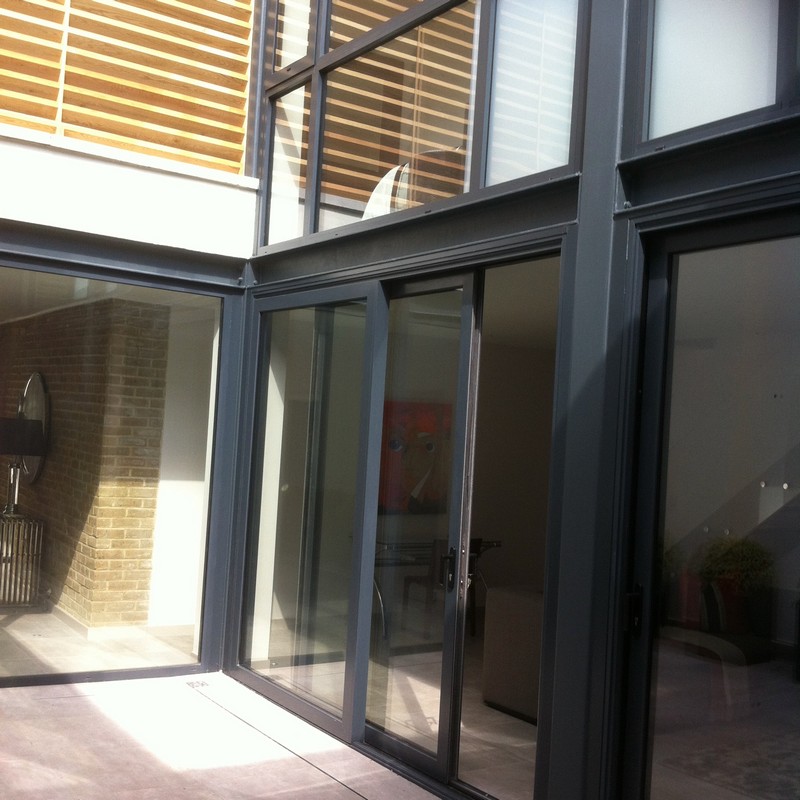 Anthracite aluminium sliding patio doors fitted in South Kensington